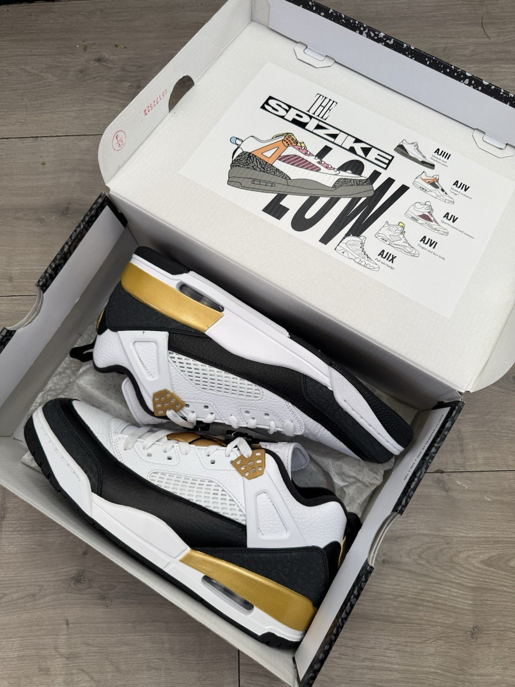 Jordan Spizike Low White Black Metallic Gold Size UK 9.51