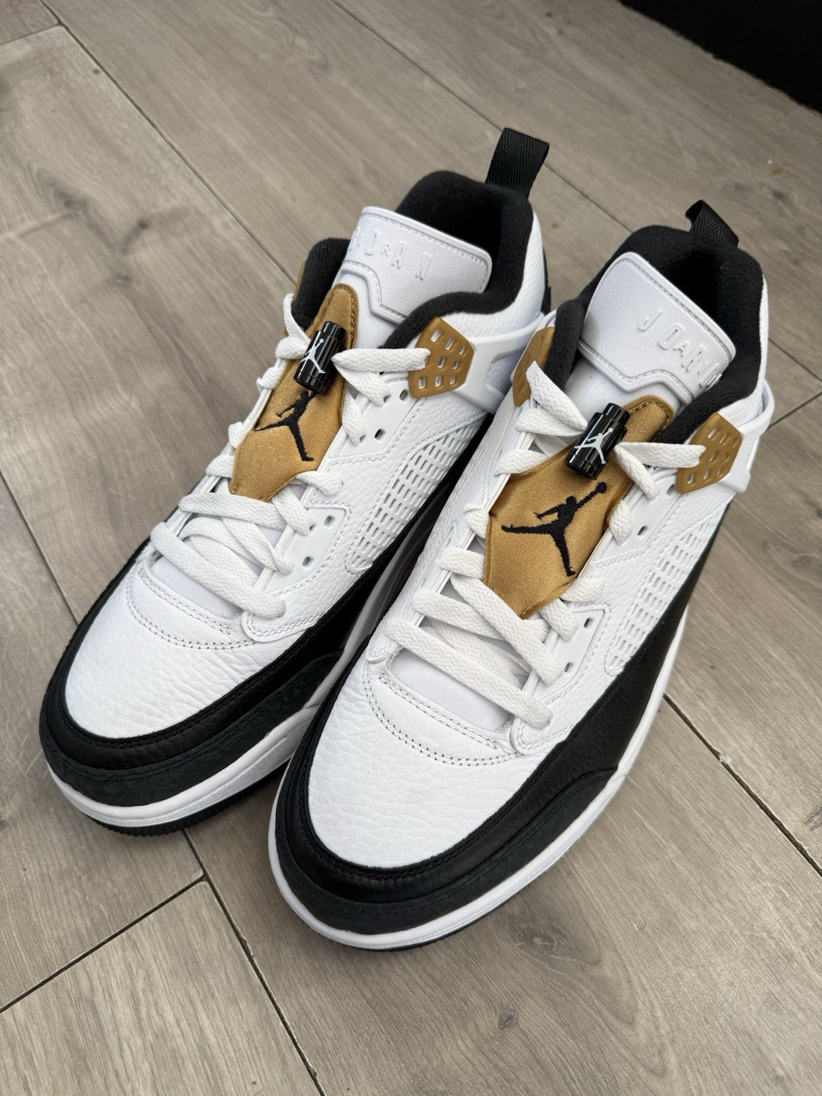 Jordan Spizike Low White Black Metallic Gold Size UK 9.52